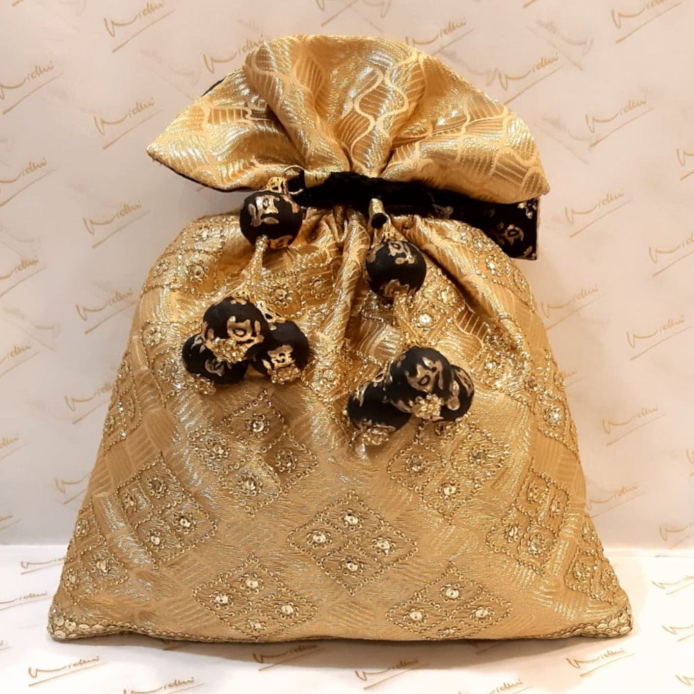 Benaras Brocade Potli With Embroidery